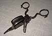 ljussax = candle snuffer