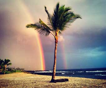 Double rainbow on the beach